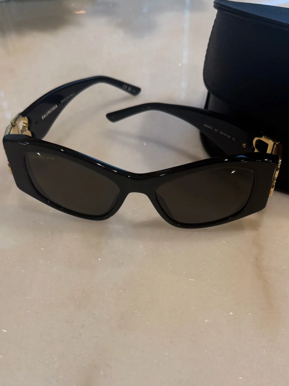 Balenciaga Black Sunglasses with Gold Accents